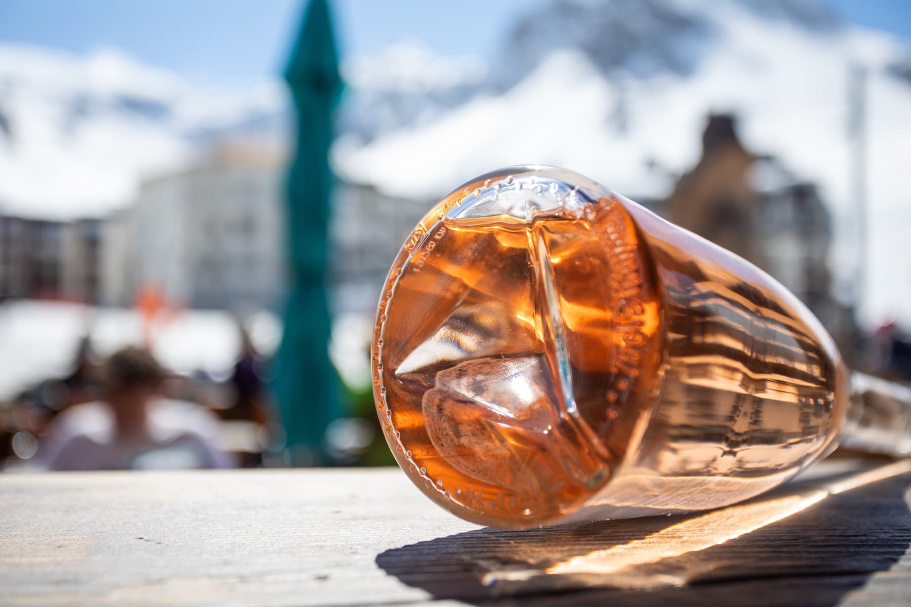 Queen Côtes De Provence Rosé bottle in the mountains